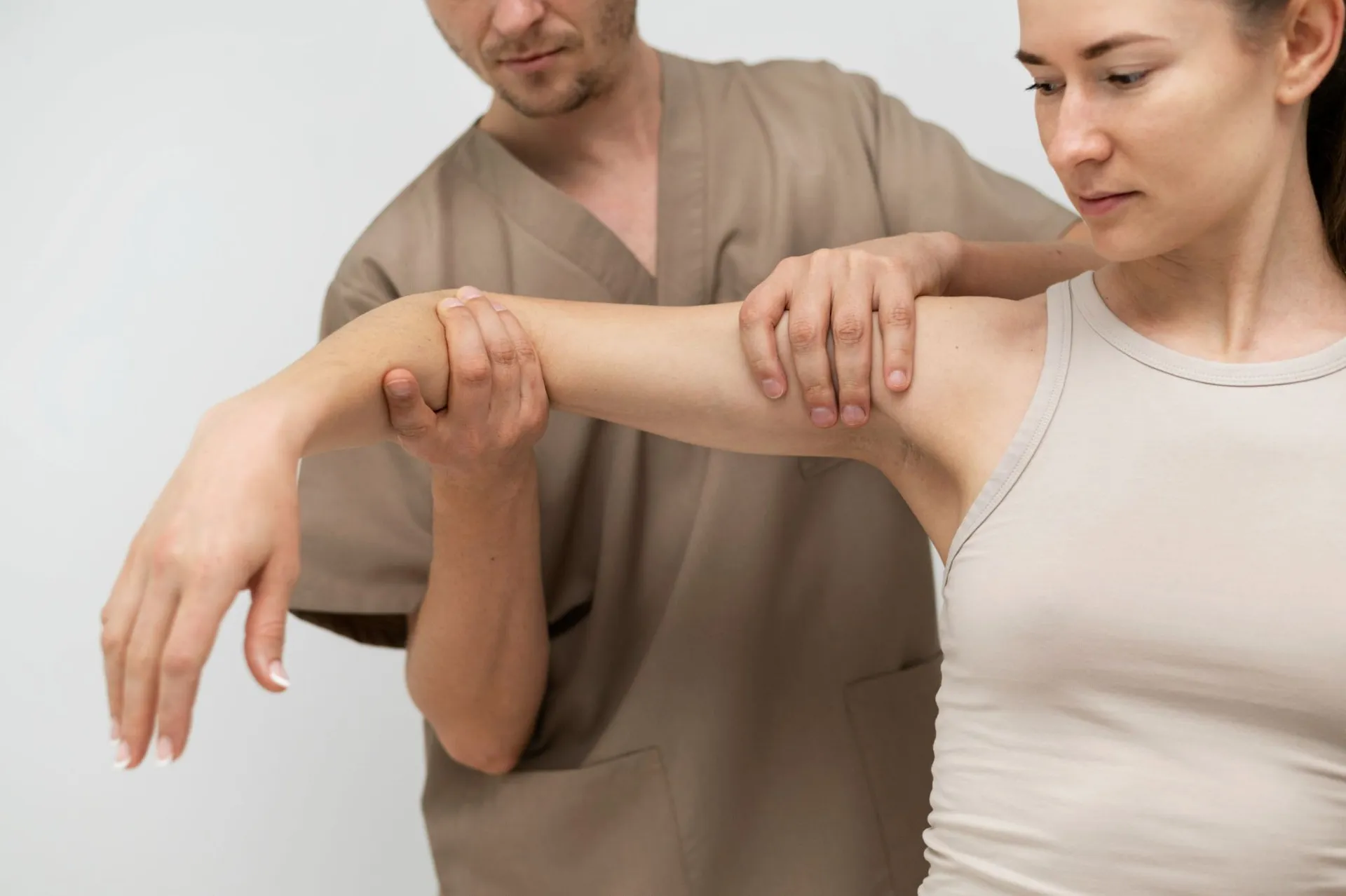 Can’t Shake That Arm Pain? A Chiropractor Might Be the Answer
